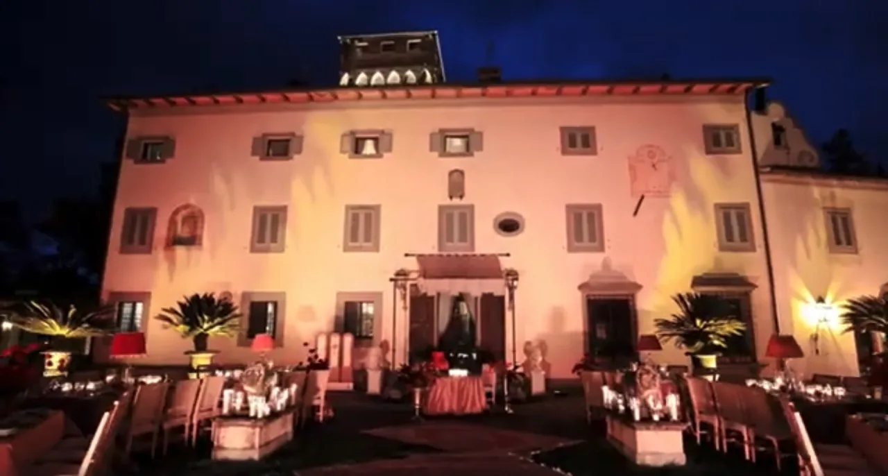 Antica Fattoria di Paterno illuminated for an evening reception